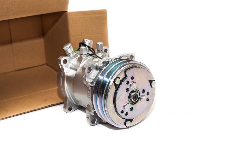 An automotive part packed in a corrugated box