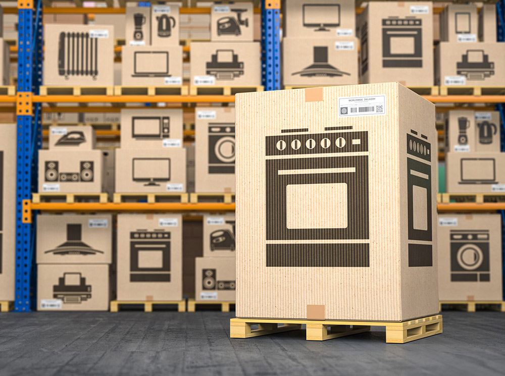 A large corrugated box on a pallet in a warehouse