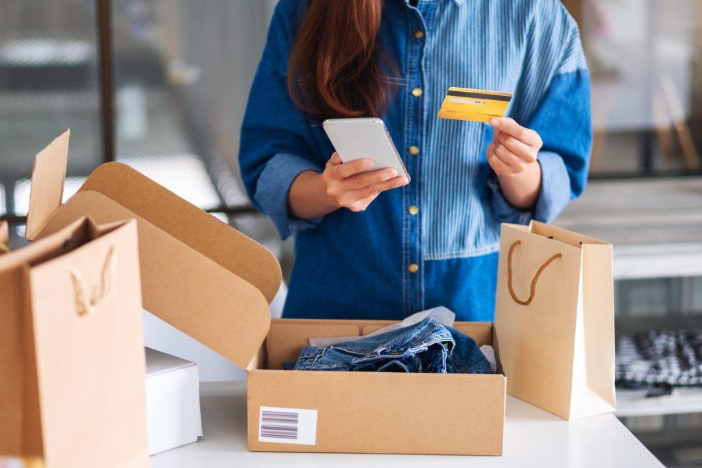 A shopper opening an ecommerce order