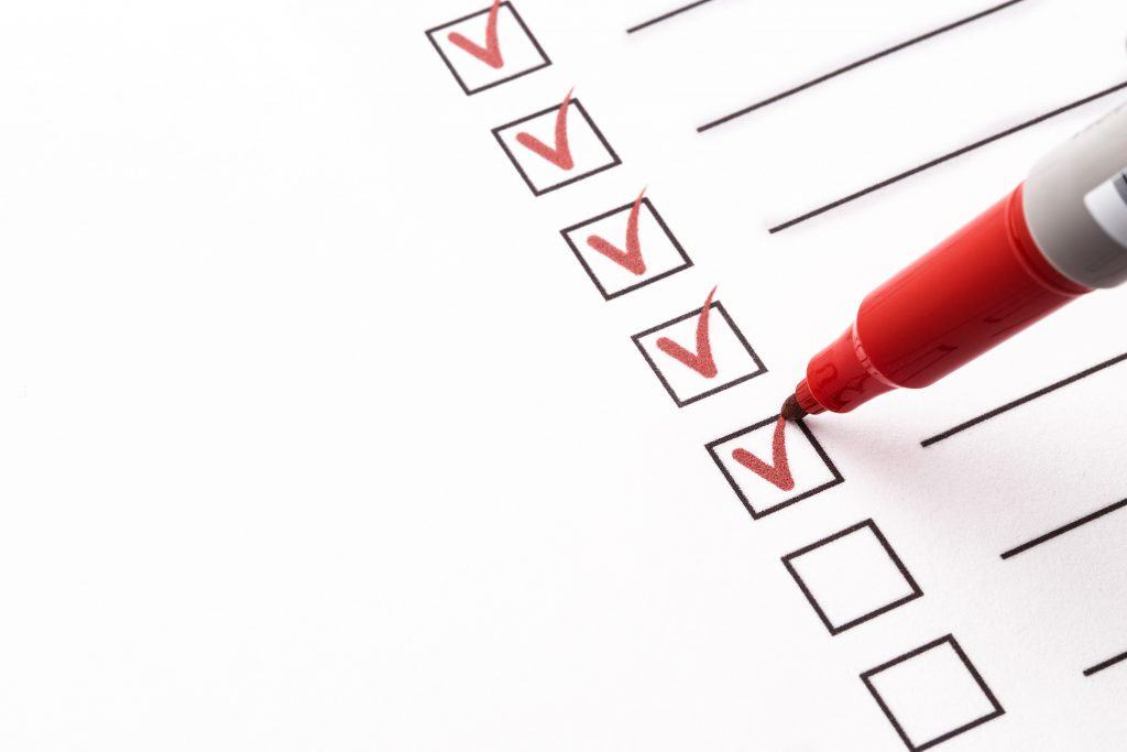 A quality checklist being ticked off